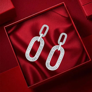 Silver Dangle Earrings for Women: The Evening Style Guide | Nipura