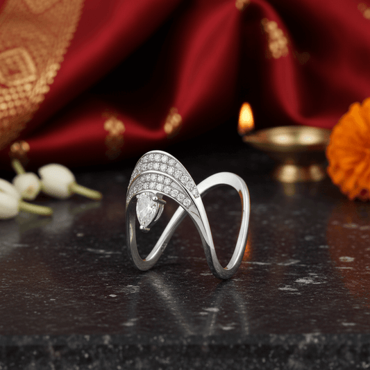 Nipura 925 Sterling Silver Vanki Ring with Pear CZ Centerpiece